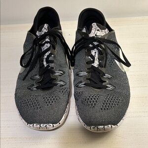 Nike Women's Black and White Flyknit Running Shoes